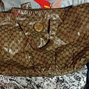 Gucci Shiny Brown Monogram Travel Bag
